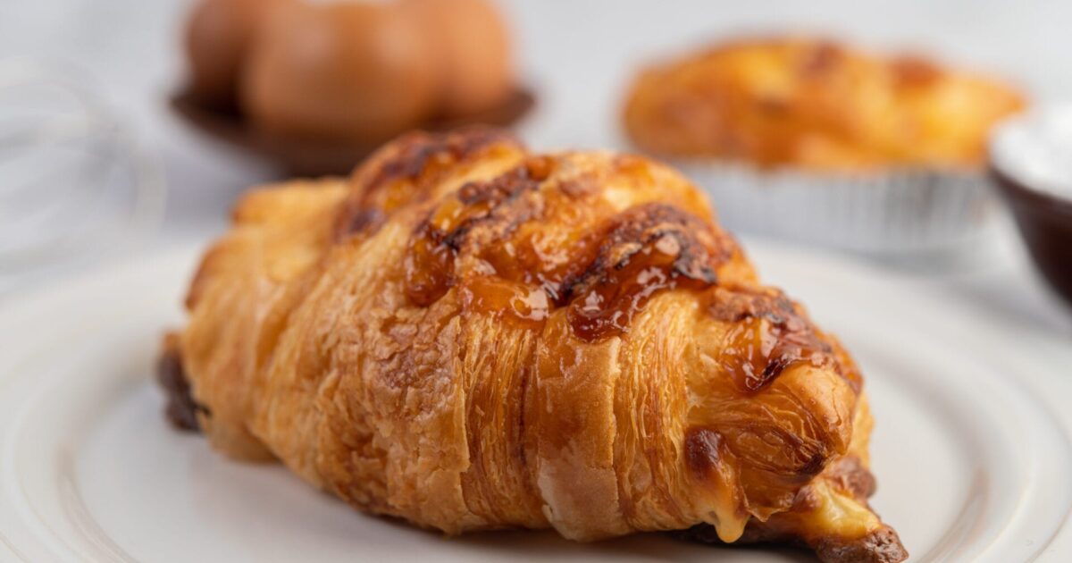 Cooked bread with ingredients Eggs and tapioca flour in a cup. Selective focus.