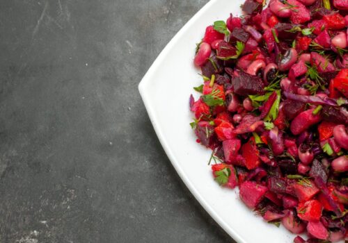 top-view-tasty-vinaigrette-salad-with-beets-beans-grey-surface